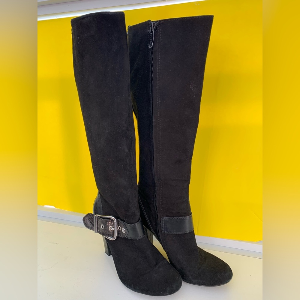 BCBGeneration black suede heeled boots with buckle accent.